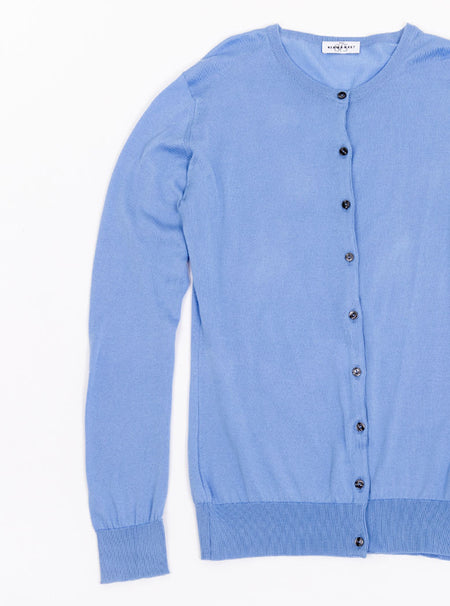 Flat lay of women's cornflower blue long sleeved cardigan knit in a luxury and premium sea island cotton.